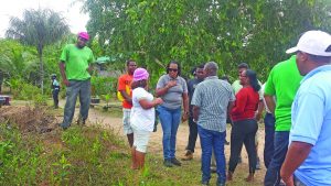 Minister within the Public Infrastructure Ministry, Annette Ferguson speaking to residents of the mining community during the visit