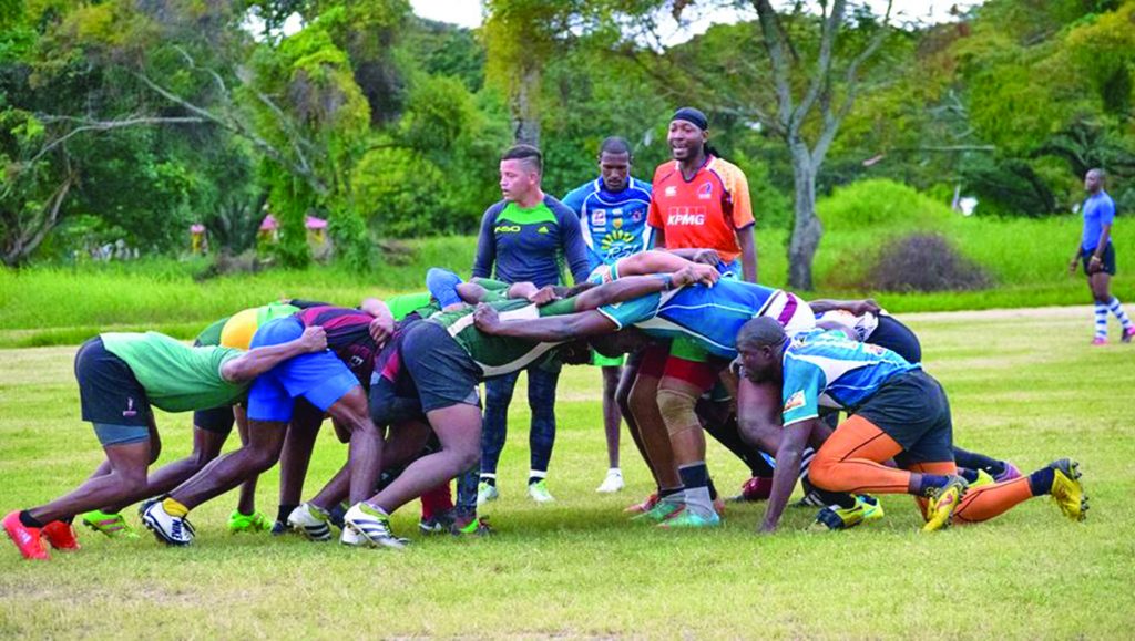 Local rugby players in a scrum recently at the national park rugby field 