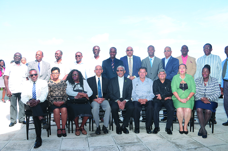 President David Granger poses with the Mayors and Deputy Mayors of the respective towns for a group photo
