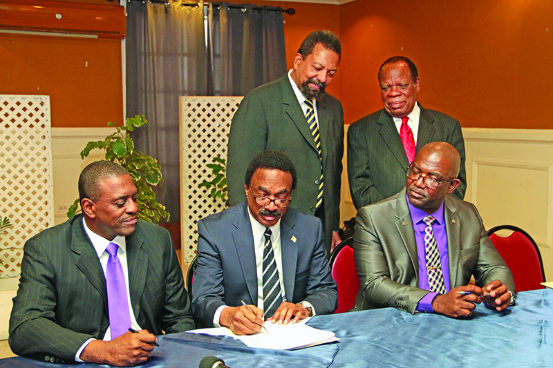 Attorney General Basil Williams and representatives of UCC/LCA signing the Memorandum of Understanding for the establishment of the law school in Guyana 