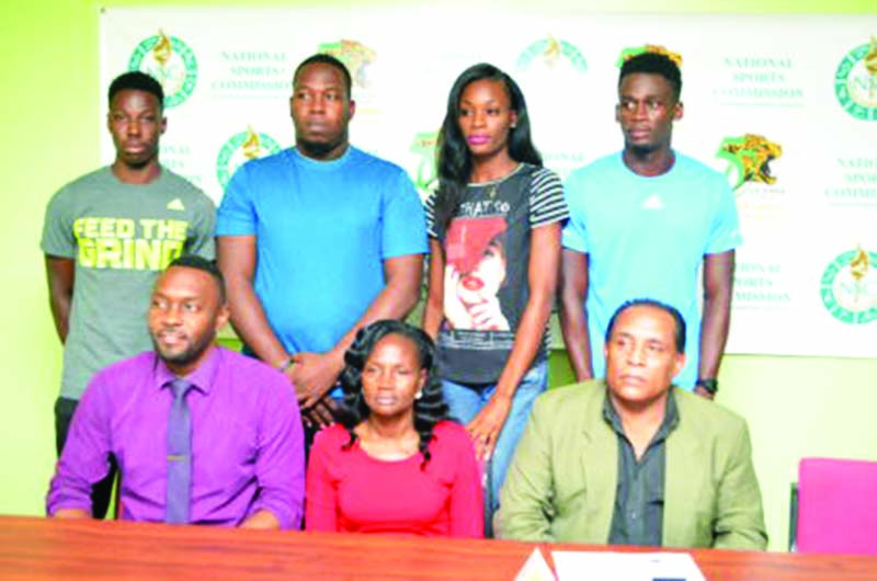 (front row from left) Director of Sports Christopher Jones, Commissioner to the National Sports Commission, Lavern Fraser and Chairman of the National Sports Commission, Ivan Persaud. (back row from left) Emmanuel Archibald, Alque Stanley, Natrina Hooper and Owen Adonis.