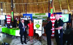 From left to right; Ivan Persaud, Jennifer Cipriani, Wayne Forde and Ian Greenwood officially unveil the ATC insignia  