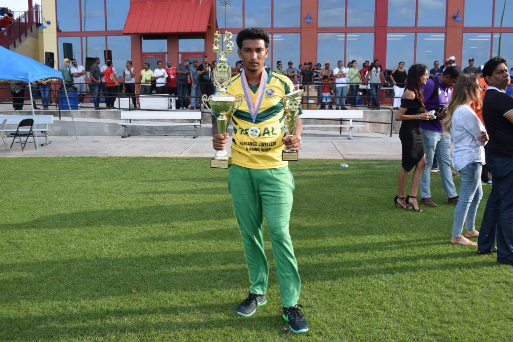 Sewchand Budhu poses with his silverware which represents a memorable debut in Florida Cup