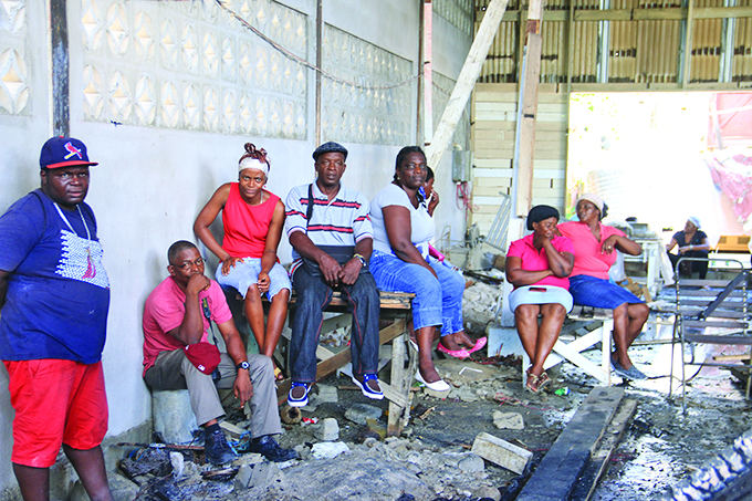 Employees of Benjamin’s Bakery contemplating their next move  