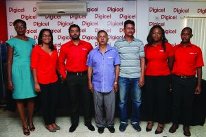 (L-R) Allison Yearwood, Communication Manager Vidya Sanichara, Retail Sales Manager Richard Das, GFSCA Ramchand Ragbeer, Khalid Baksh, Sponsorship & Events Manager Louana Abrams and Seaon Jackman at the launch 