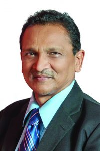 UTT Professor,  Dr Kumar Mahabir 