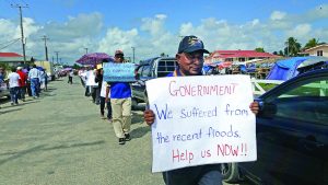 Farmers bearing placards protesting the non-support of Government