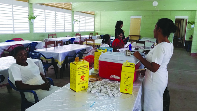 The vaccination team at the Anna Regina Multilateral Secondary School 