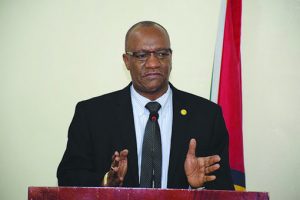 Minister of State Joseph Harmon 