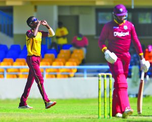 Akeal Hosein celebrates the dismissal of Bhaskar Yadram at the SVRCG on Monday  