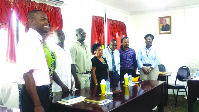 KNDC Chairman and Vice Chairman (centre) with regional officials following the swearing in ceremony 