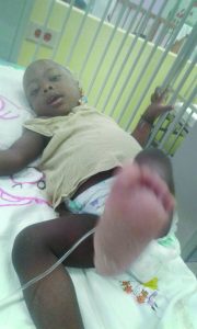 Little Lloyd Griffith Jr in his hospital bed  