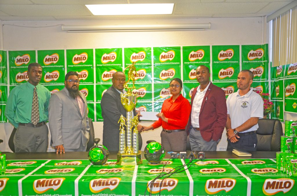 (L-R) Mark Allyne, Beepats rep Christopher Beepat, Pretra Director Troy Mendonca, Milo Brand Manager Renita Seetal, GFF President Wayne Forde and Ministry of Education’s Nicholas Fraser at the head table during the symbolic launch ceremony