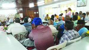 Agriculture Minister Noel Holder interacting with Region Two farmers