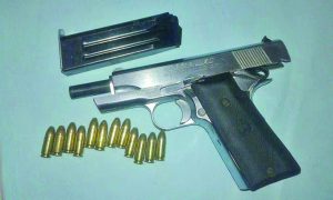 The unlicensed gun, ammo found in the suspect’s possession  