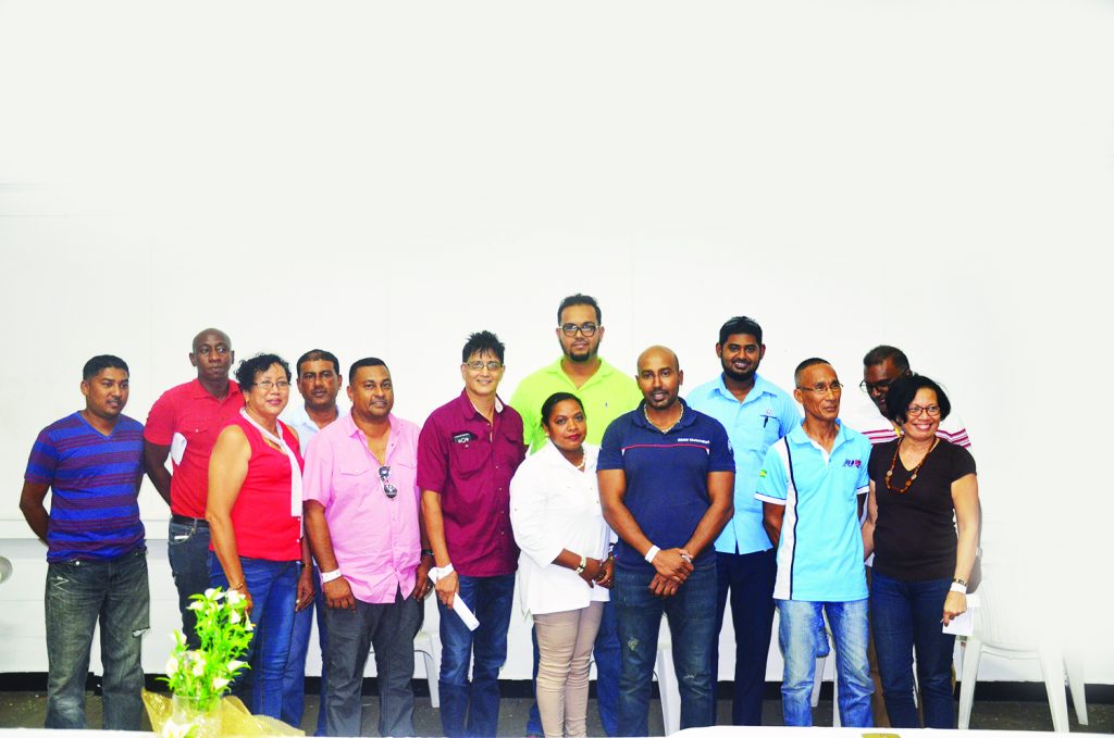 The New Exec! (L-R) Committee member Paul Jiwanram, Assistant Secretary/Treasurer John Bennett, GMRSC office Executive Desriee Lee, Secretary Azim Jafffar, Treasurer Noel Shewjattan, Committee members Kamal Seebaran and Diana D’Ornellas, President Rameez Mohammed, Vice President Hansraj Singh, Committee member Azaad Hassan, Technical Advisor Brian TenPow, Club Captain Sunil Persaud and office Executive Cheryl Gonzales; absent from photo is Wayne Vieira 