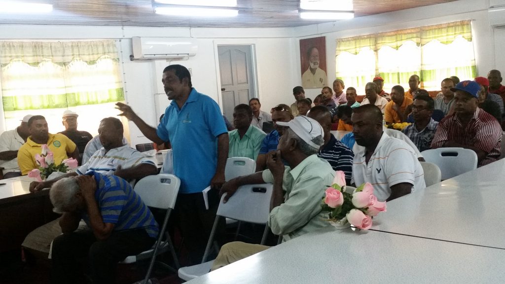 AFC Councillor Naithram, along with rice farmers at the meeting with Agriculture Minister, Noel Holder  