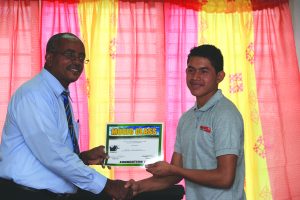 One of the students receiving his certificate