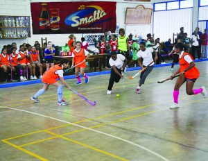 St Joseph’s Akeela Ralph counterattacks against the Fernandes sisters and top scorer Sarah Klautky of Marian Academy 