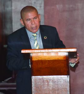Social Cohesion Minister, Dr George Norton addressing the residents of Charity who gathered for the public meeting