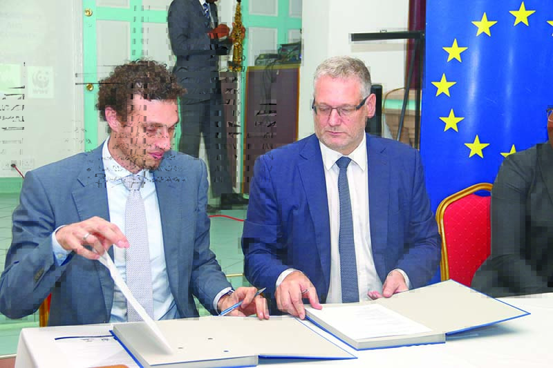 EU Ambassador Jernej Videtič  and WWF Guianas Representative Laurens Gomes sign onto the project, entitled “Promoting Integrated and Participatory Ocean Governance in Guyana and Suriname: the Eastern Gate to the Caribbean”