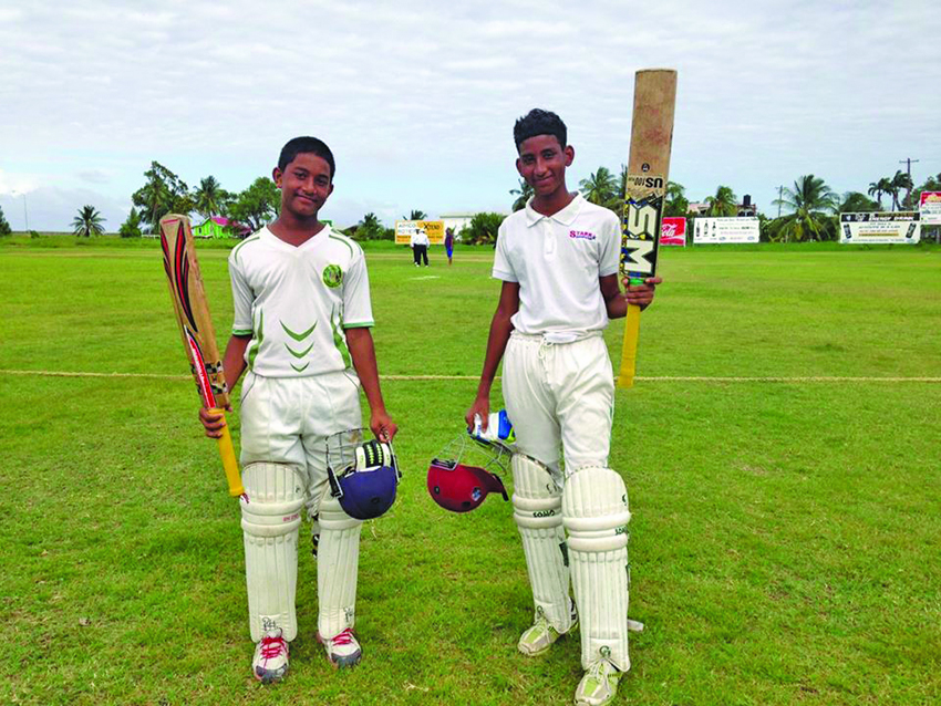 Mohindra Dindyal (left) and Chad Shivrattan shared an unbroken 172 runs partnership for East Bank against West Demerara during the recent Demerara Inter-Association tournament 