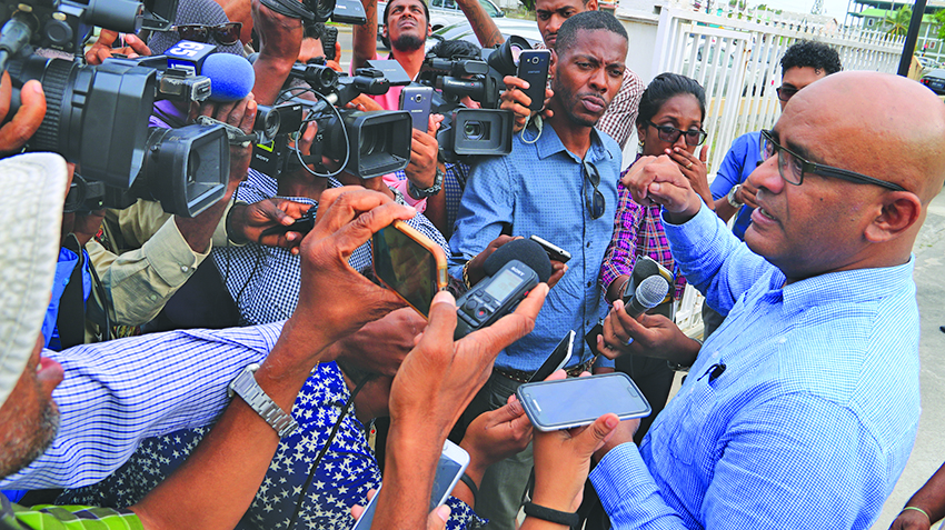 Opposition Leader Bharrat Jagdeo speaking with the media outside  SOCU’s headquarters on Tuesday