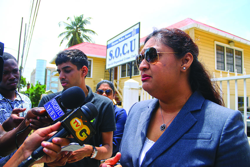 Former Education Minister Priya Manickchand speaking with media following her interview with SOCU