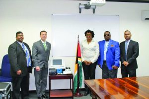 Junior Public Infrastructure Minister Annette Ferguson and US Embassy Deputy Chief of Mission Terry Steers-Gonzalez (second left) shortly after handing over the equipment along with the other officials of the local aviation sector 