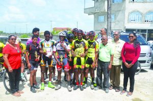 The winners take a photo opportunity with the organisers and sponsors, as well as members of the People’s Progressive Party 