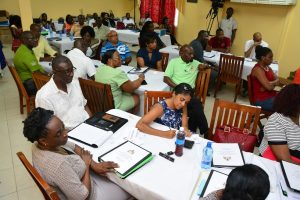 Permanent Secretaries and Heads of the various Departments paying keen attention as Minister Harmon discussed Permanent Secretaries’ responsibilities  