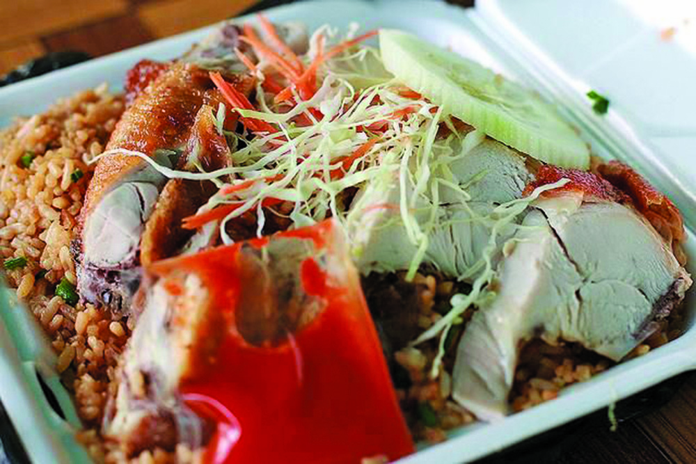 The Famous Chicken Fried Rice of Guyana - Guyana Times