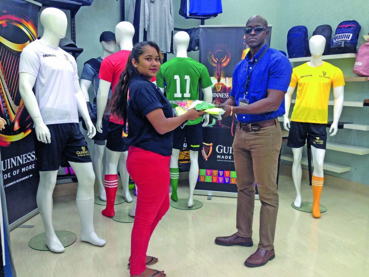 Colours Boutique hands over official uniforms Guyana Times