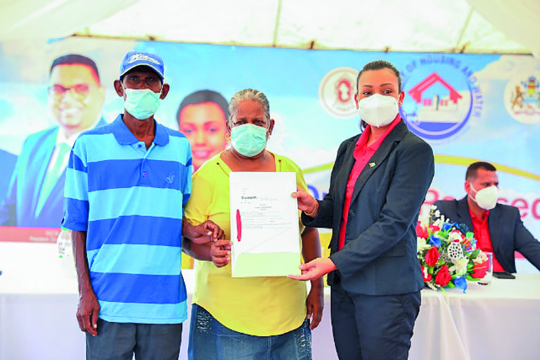 Another 150 Guyanese receive land titles, transports - Guyana Times