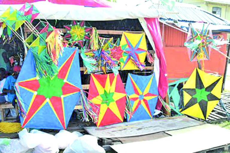 Making the traditional “star point kite” Guyana Times