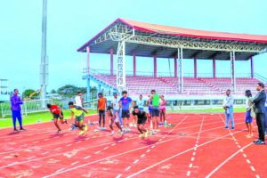 Athletic club engaged by Minister Ramson and former NFL player Willie Gault  - Guyana Times