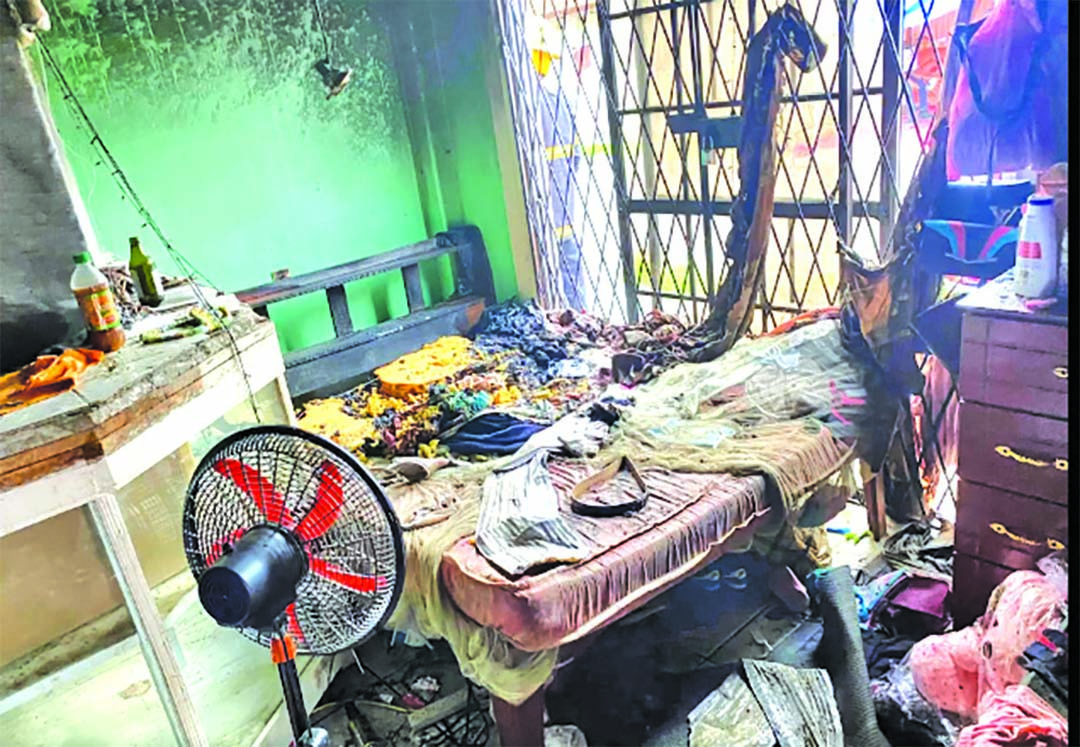 Woman caught on camera setting Norton St house on fire - Guyana Times