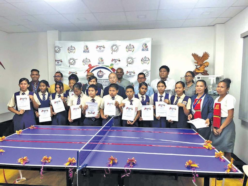 CNOOC, GTTA distribute table tennis equipment to hinterland schools