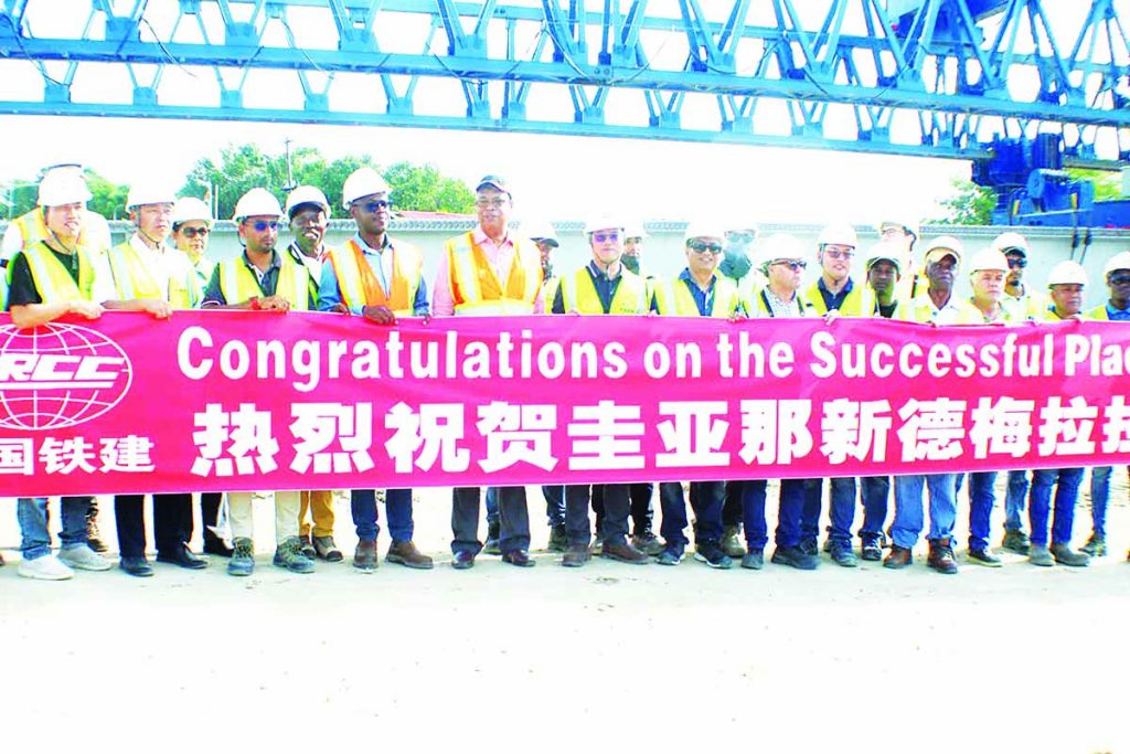 1st precast girder installed at new Demerara River Bridge - Guyana Times