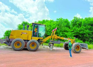 New $900M motor grader begins rehabilitation of Mahdia-Campbelltown Road