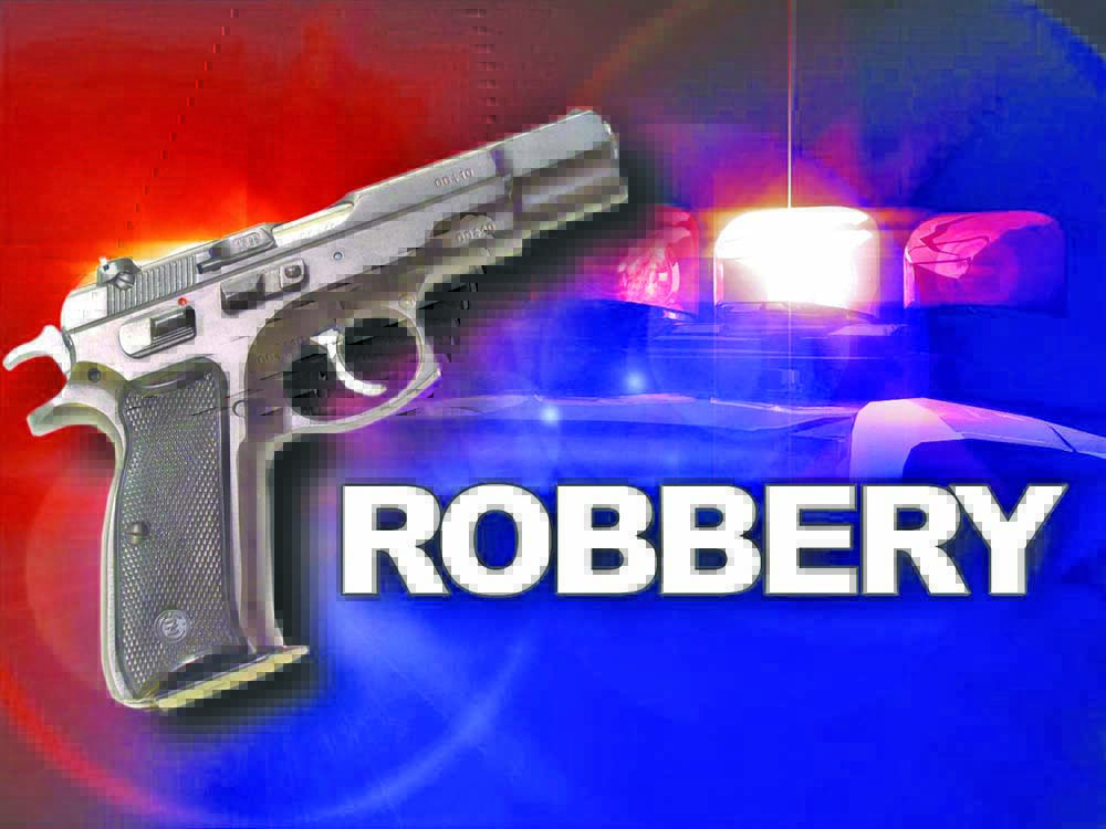 Lone gunman escapes with $1.3M from betting shop