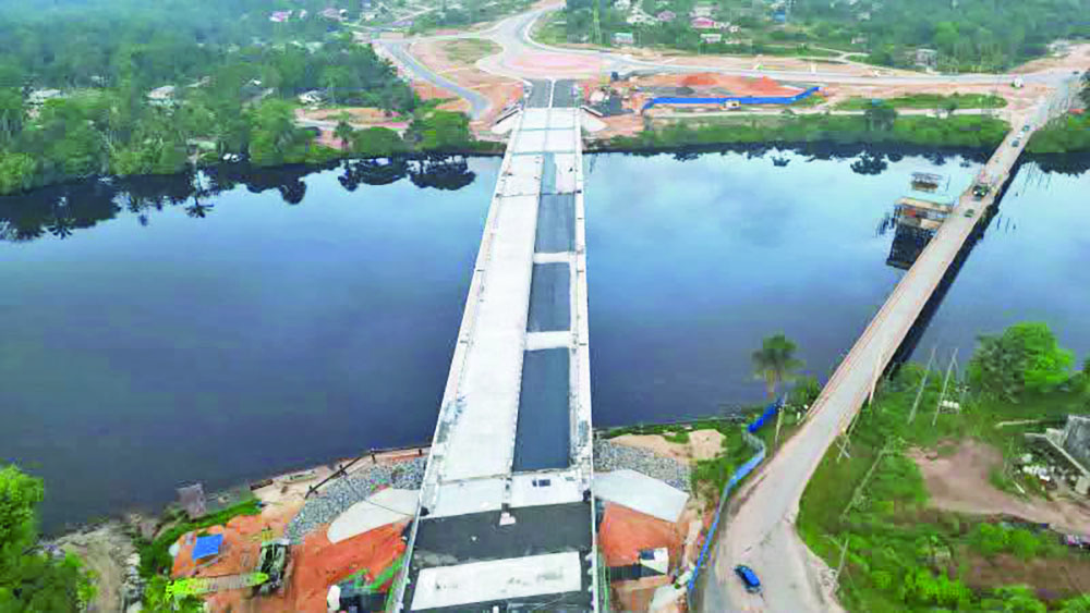 Asphalt paving begins on new Wismar-Mackenzie Bridge