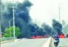 Burning debris at Vigilance causes traffic delays; Police maintain presence in area