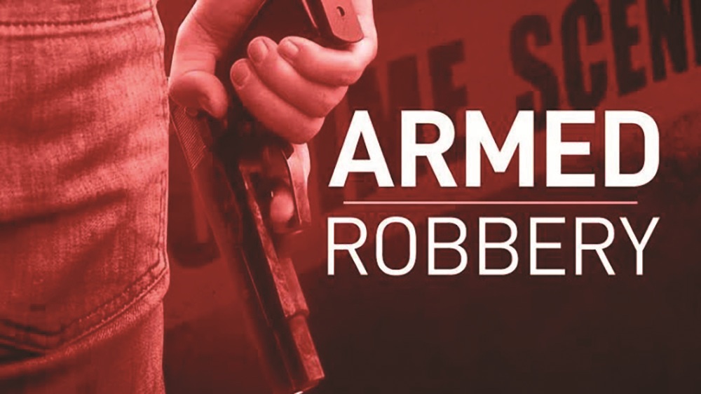 Gunmen open fire while relieving teacher of motorcycle